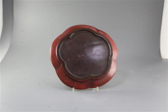 A Chinese red lacquer pentafoil shaped dish, width 28cm